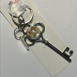 Silver and Cream Key-Shaped Keychain